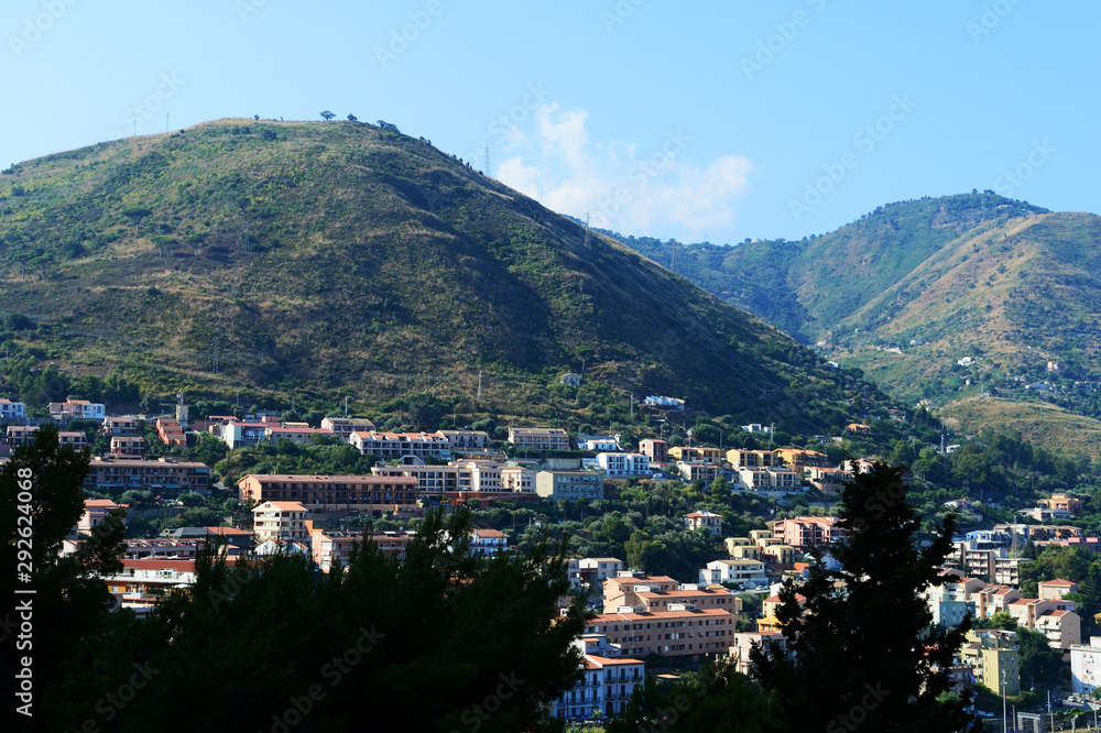 Fototapeta premium View of Cefalu town from the Rocca di Cefalu in the early morning. Sicily, Italy