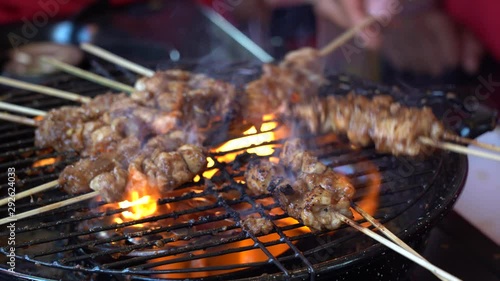 Wallpaper Mural Street vendor sells grilled chicken meat at street food market in island Bali, Indonesia. Asian cuisine. Close up Torontodigital.ca