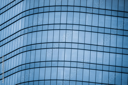 Urban abstract - windowed corner of office building.