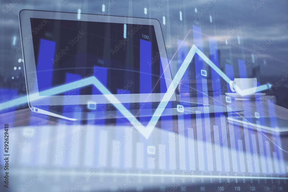 Stock market graph on background with desk and personal computer. Double exposure. Concept of financial analysis. Stock market graph on background with desk and personal computer. Double exposure. Concept of financial analysis.