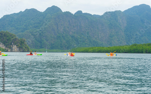 Group of tourists kayaking at Ao tha lane, Krabi, Thailand photo