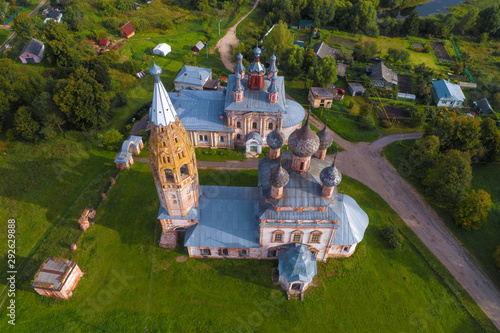 Top view on the old church in the village of Parskoe on a September afternoon (aerial photography). Ivanovo region, Russia photo