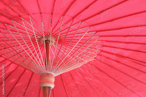 Background of colorful handmade red umbrellas