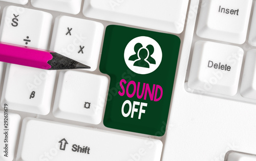 Text sign showing Sound Off. Business photo text To not hear any kind of sensation produced by stimulation White pc keyboard with empty note paper above white background key copy space photo