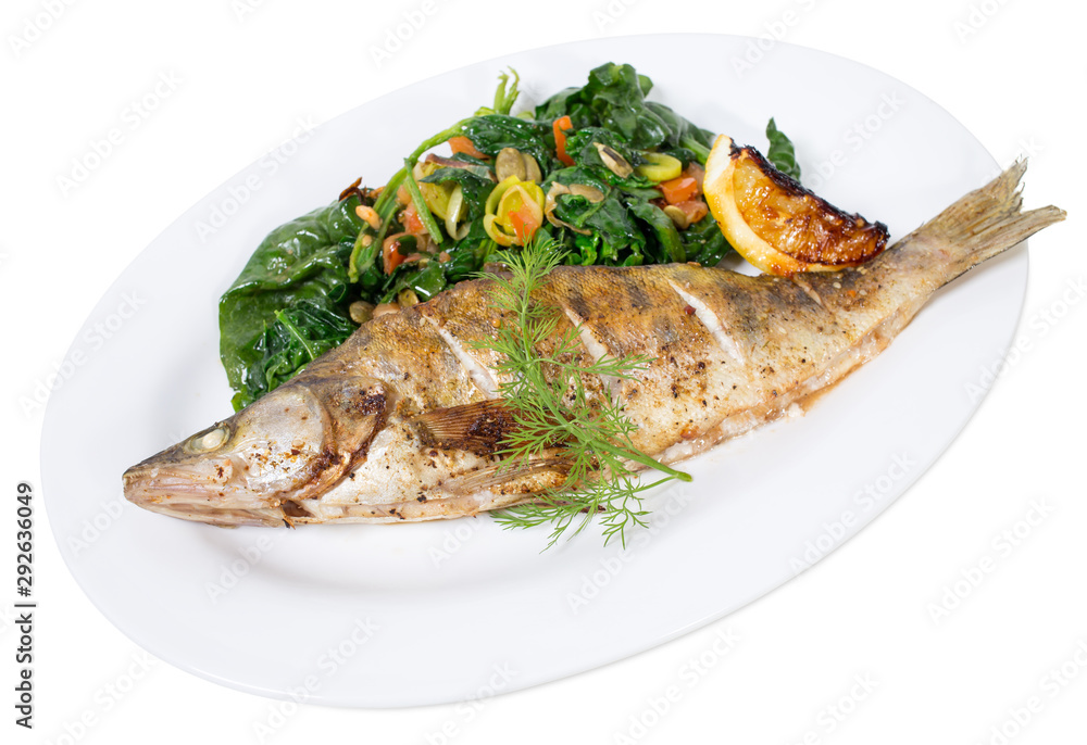 Baked dorado with warm spinach salad.