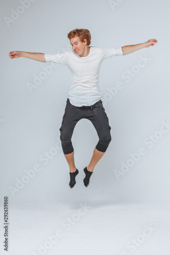 man jumping on a light background