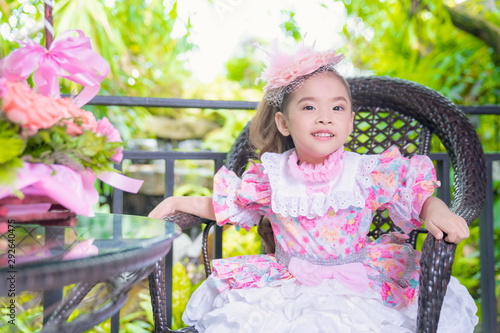 Little girl Wearing a lolita dress In the garden