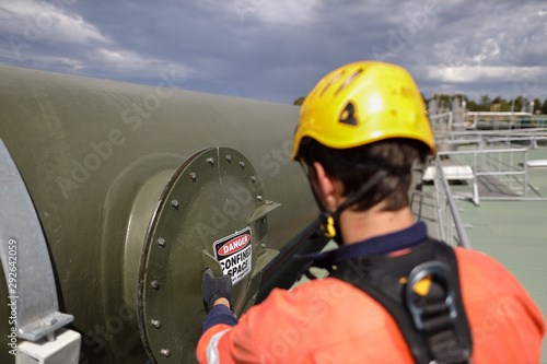 Quadro su tela Certifier maintenance construction worker wearing black safety glove full body s