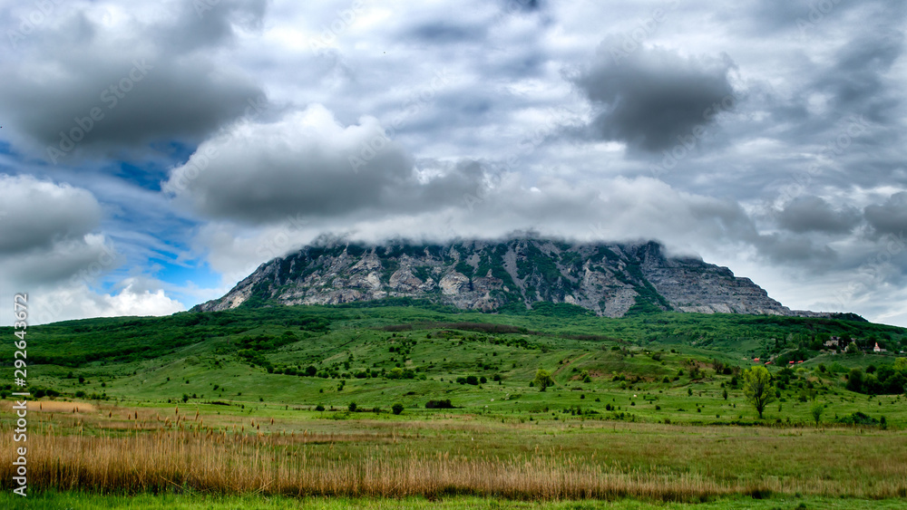 Green mountain in white clouds Green mountain in white clouds