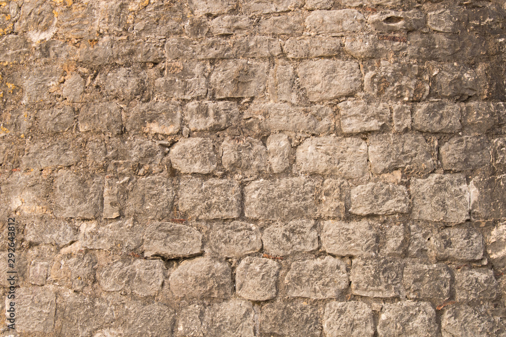 Background texture of the old fortress stone wall. Conceptual background for designers. Background texture of the old fortress stone wall. Conceptual background for designers.
