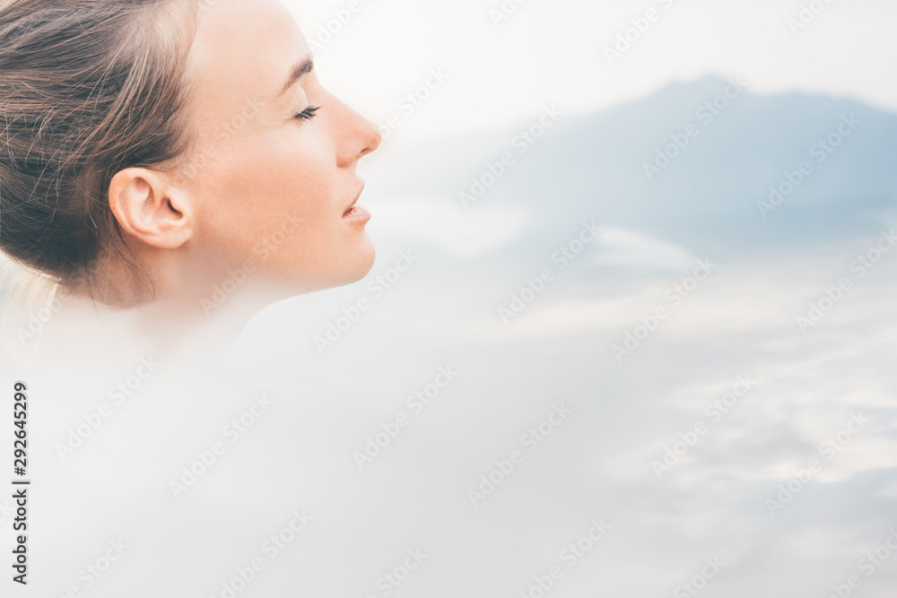 Sport woman relaxing on mountain cliff above the clouds. Alone travel healthy lifestyle. Healthy life Concept. Sport woman relaxing on mountain cliff above the clouds. Alone travel healthy lifestyle. Healthy life Concept.