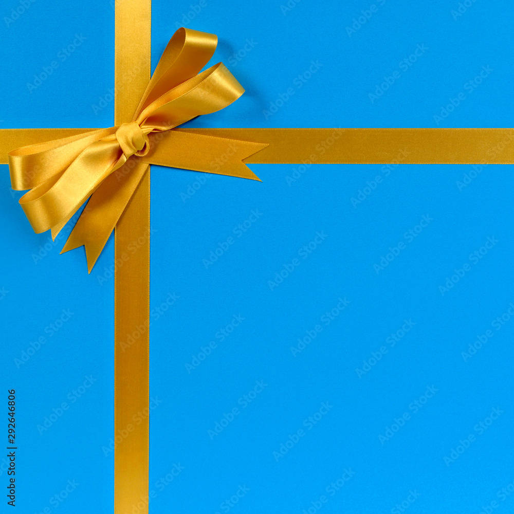 Gold bow gift ribbon blue background Gold bow gift ribbon blue background