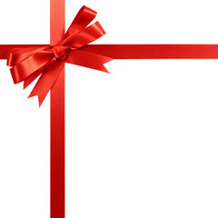 Red gift ribbon bow vertical corner border frame  isolated on white.