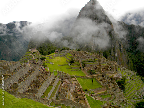 Machu Picchu view with clouds in Peru, South America. UNESCO World Heritage Site. Destination