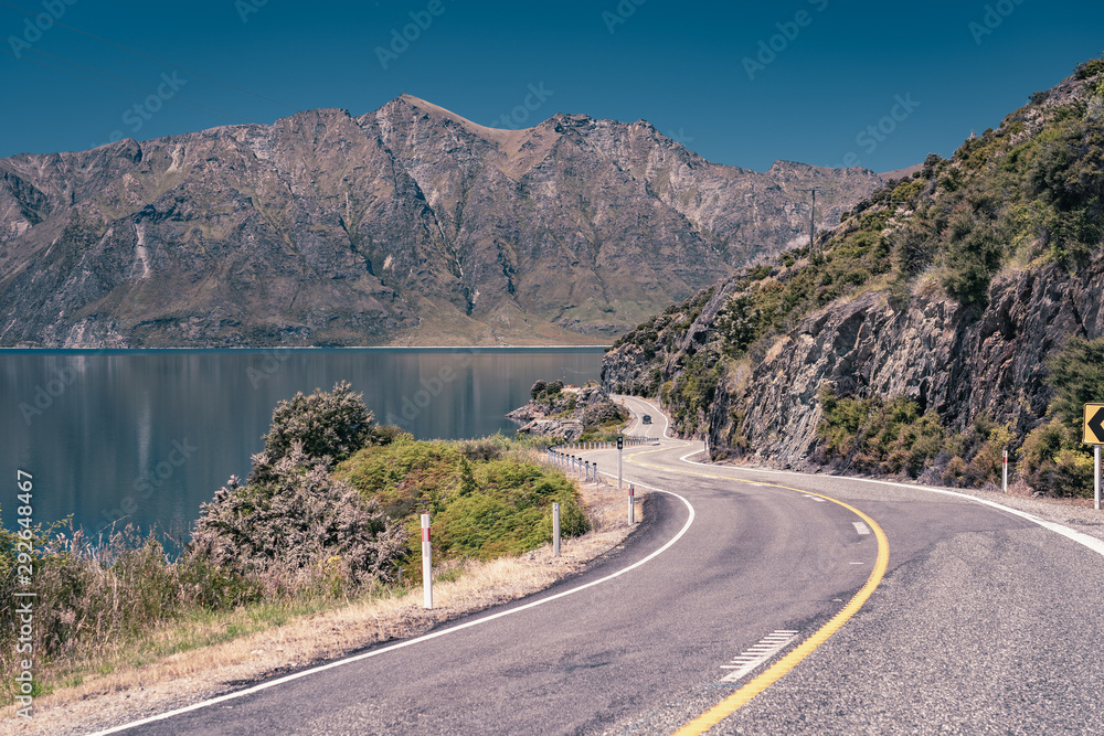 Twisty roads along lake Hawea in New Zealand