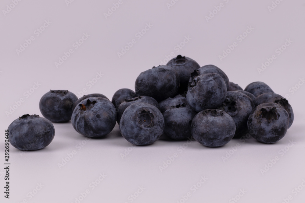 Close front view of juicy organic harvest of berries blueberries Close front view of juicy organic harvest of berries blueberries