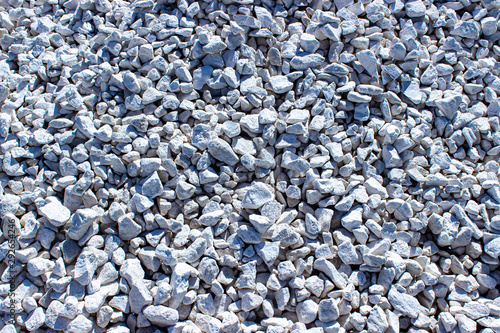 Background of gray granite gravel.