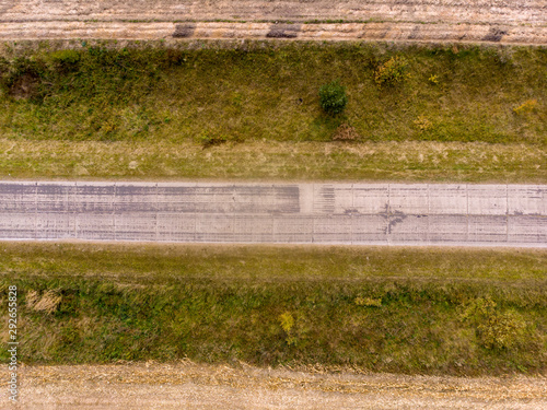 Aerial view of empty road through countryside in autumn. photo