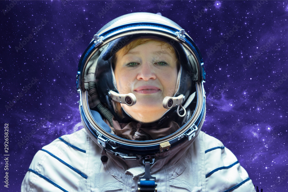 happy astronaut woman portrait in the protective scafander on the space mission happy astronaut woman portrait in the protective scafander on the space mission