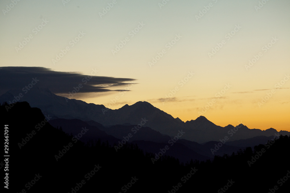 Sunrise above peak in the Himalaya range, Nepal Sunrise above peak in the Himalaya range, Nepal