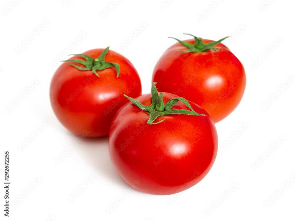 Red fresh tomatoes with cuttings on white background Red fresh tomatoes with cuttings on white background