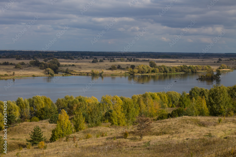 Autumn panoramic landscape with river and hills cloudy day in Konstantinovo village Russia Autumn panoramic landscape with river and hills cloudy day in Konstantinovo village Russia