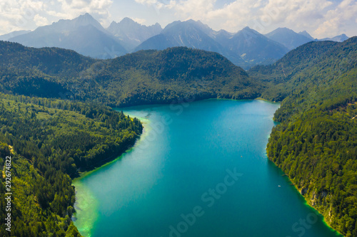 Aerial view on Alpsee lake  Bavaria  Germany. Concept of traveling and hiking in German Alps.