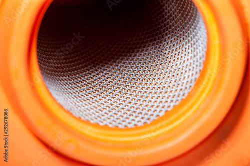 Fotografie paper car air filter with an iron grid for the inflexibility of the body and rubber seal, car part inside view