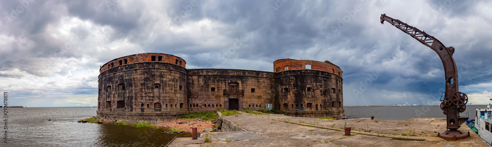 Saint-Petersburg. Kronshtadt. Panorama of an abandoned Fort in the Gulf of Finland. Abandoned building. Architecture Of Russia. Kronstadt FORTS. Old mechanism. Rusty lift.