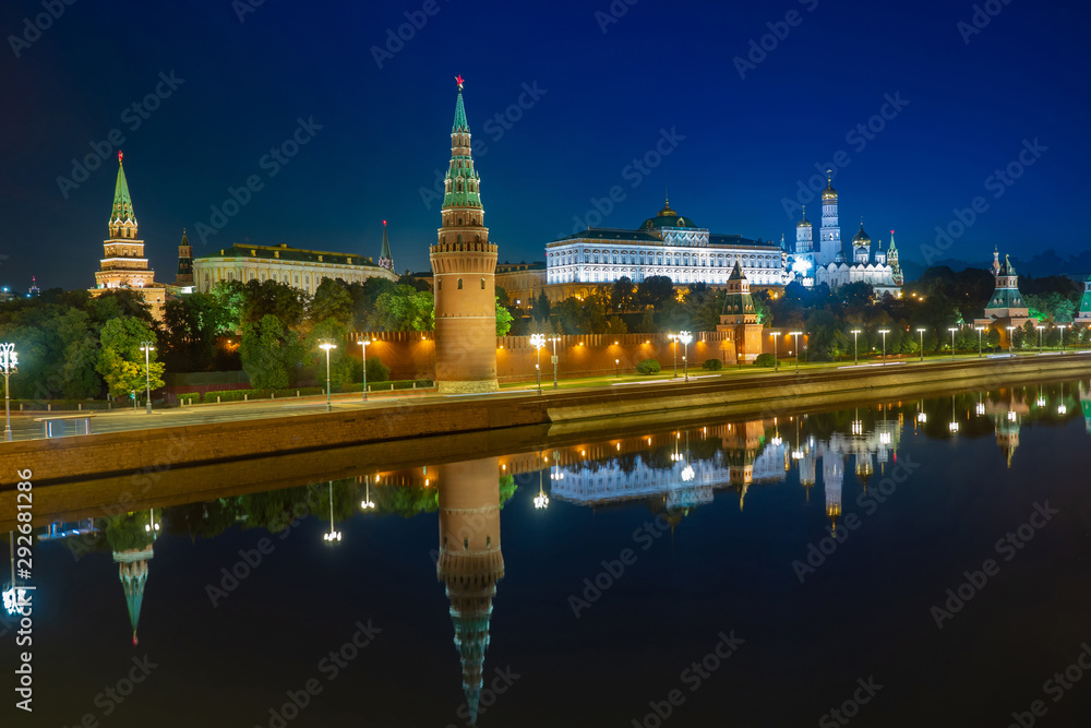 Evening Moscow is reflected in the river. Panorama of the evening capital of Russia. Business card of Moscow. Kremlin embankment is empty. Kremlin. Grand Kremlin palace. Churches. Russian Federation