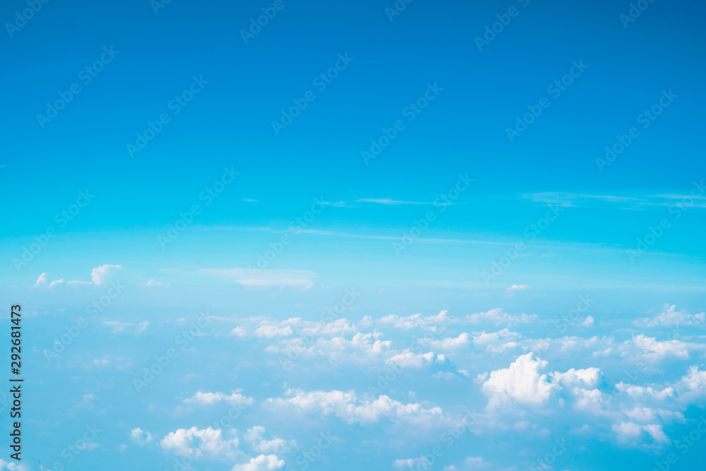 Beautiful blue and cyan cloudy sky from airplane Beautiful blue and cyan cloudy sky from airplane