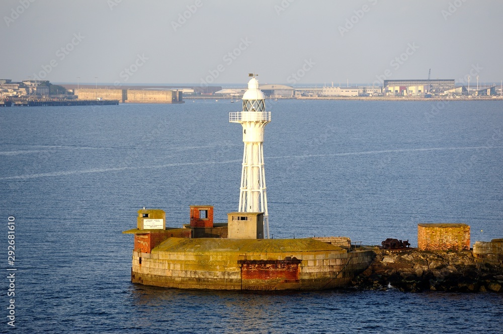 Weymouth harbour entrance light at dawn