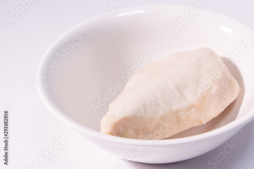 Closeup of Japanese "Salad Chicken (sarada tikin)" on plate. Salad Chicken is boiled and seasoned chicken breast. By increasing health consciousness in Japan, Salad Chicken is getting popular nowadays