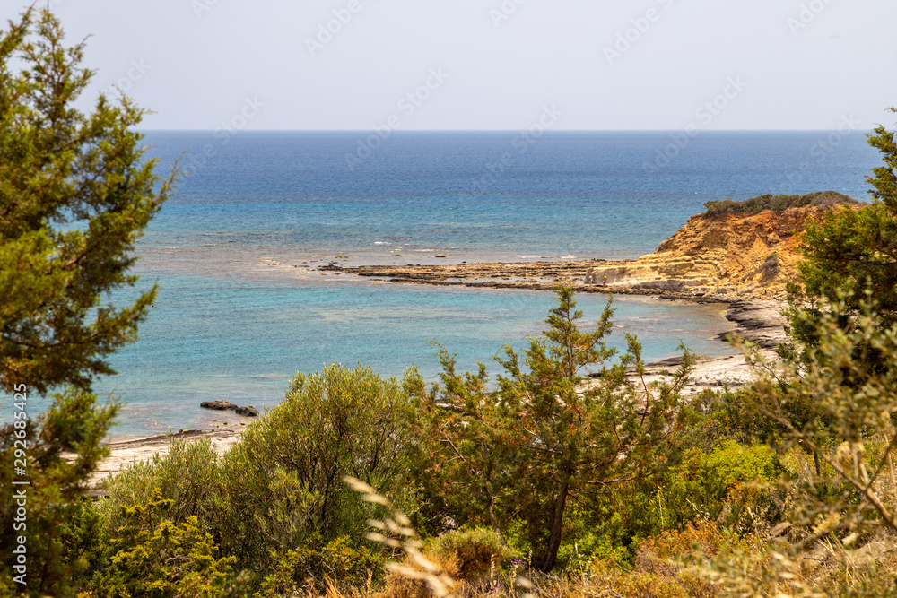 Scenic view at the coastline of Kiotari on Rhodes island, Greece with gravel beach