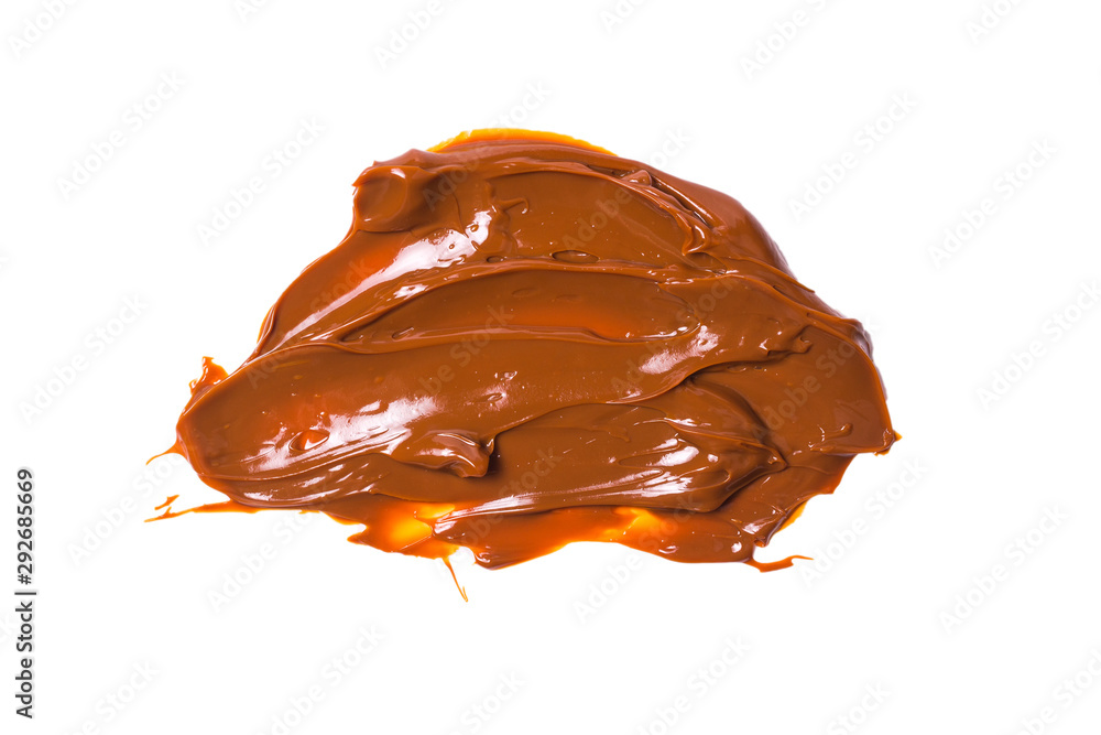 Melted tasty caramel splashes isolated on white background. Melted tasty caramel splashes isolated on white background.