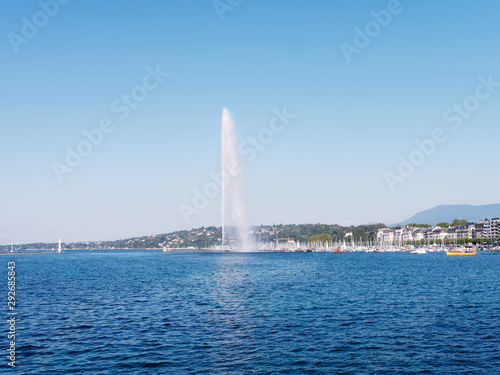 Famous Jet d'Eau fountain of the Geneva lake on a sunny day in Switzerland.