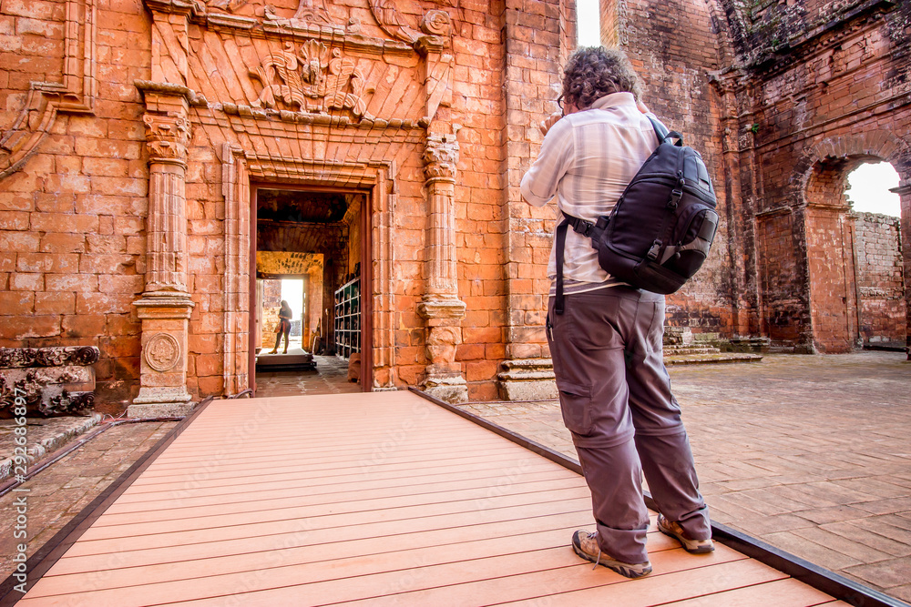 Visitor inside the Jesuit Mission Ruins at Santisima Trinidad del Parana (UNESCO World Heritage)