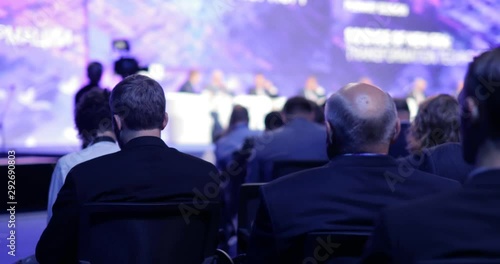 Educational science conference forum of modern technologies in scientific center. Briefing with viewers and journalists. International business and political summit in audience. Symposium with heads.