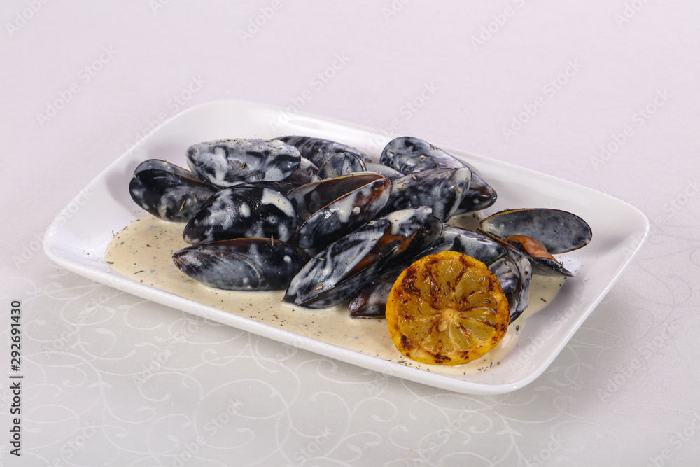 Tasty delicous Mussels with cream sauce Tasty delicous Mussels with cream sauce