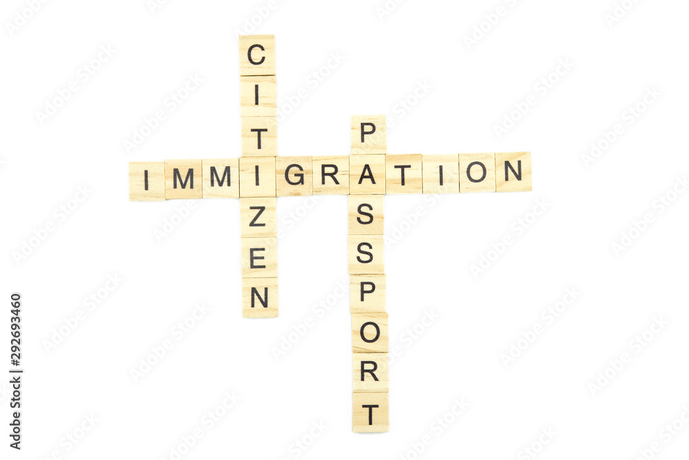 Immigration minimalistic concept. Isolated wooden letter blocks with word cloud Immigration citizen and passport