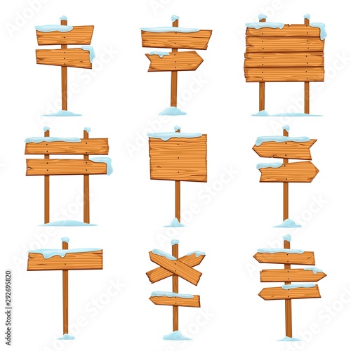 Cartoon snowed sign boards. Blank Christmas wooden signpost with snowcap. Direction street arrows with icicles in snowdrift vector set