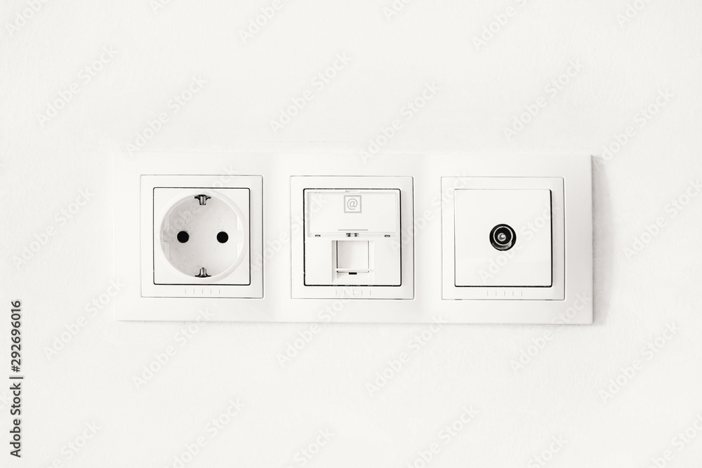 sockets with antenna cable and internet on a white wall sockets with antenna cable and internet on a white wall