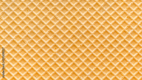abstract empty golden waffle texture, background for your design, panorama photo