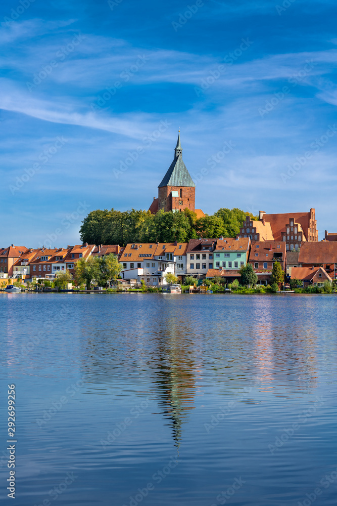 Fototapeta premium Moelln (German: Mölln), Germany. The old town, view across the City Lake.