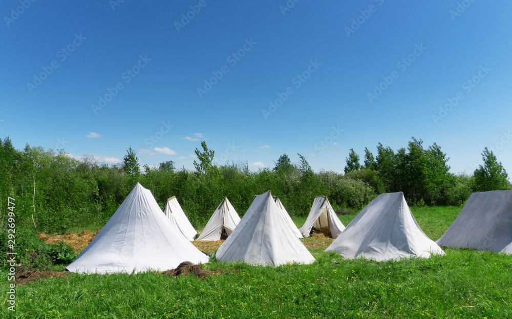 White army or humanitarian tents.
