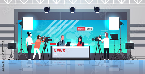 male presenter interviewing woman in television studio tv live news show video camera shooting crew broadcasting concept flat full length horizontal