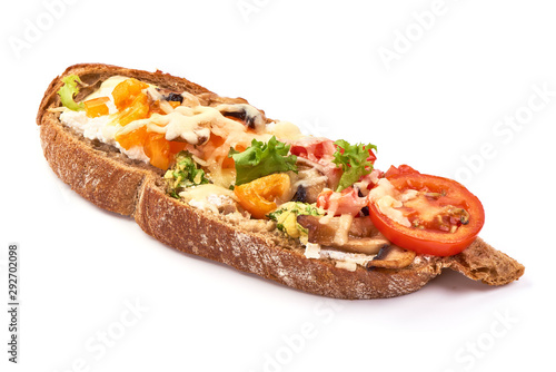 Bruschetta with cottage cheese, tomatoes, zucchini, champignon mushrooms, garlic and herbs. Spanish Tapas and Pinchos, isolated on white background