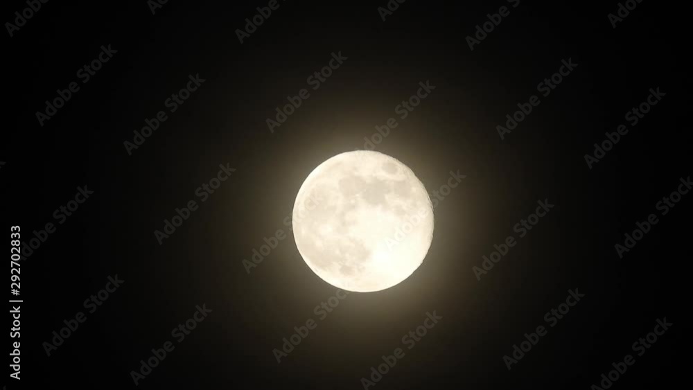 Moon with clouds in the night sky. Cloudy weather on a autumn night. Mysterious night sky with moon. Spooky night and mystery. Dramatic clouds in the moonlight. Moon with clouds in the night sky. Cloudy weather on a autumn night. Mysterious night sky with moon. Spooky night and mystery. Dramatic clouds in the moonlight.