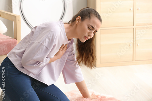 Young woman suffering from ...
