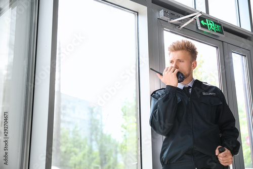 Male security guard in buil...